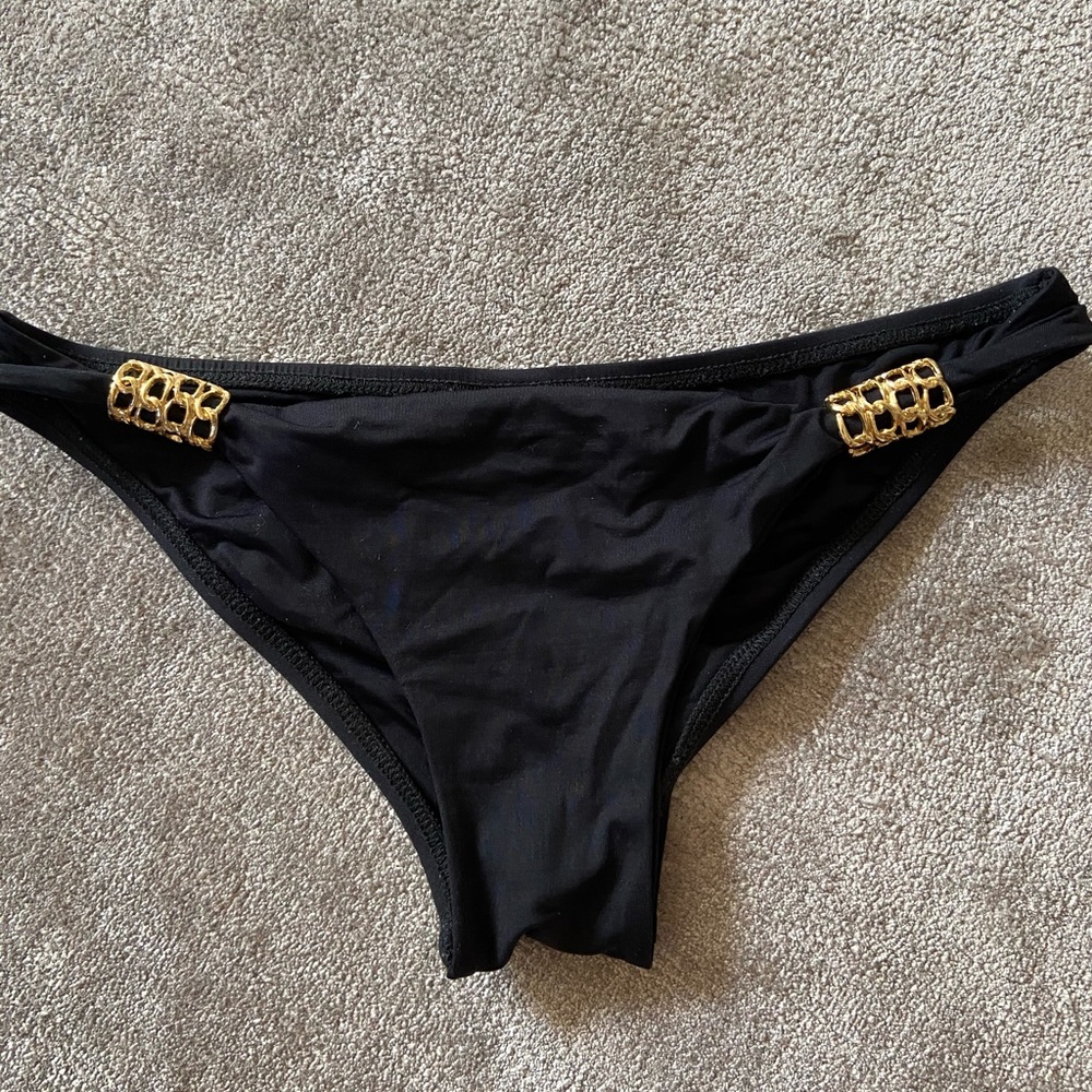 L*SPACE black bottom with gold hardware